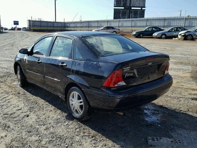 1FAFP34314W132401 - 2004 FORD FOCUS SE C BLACK photo 3