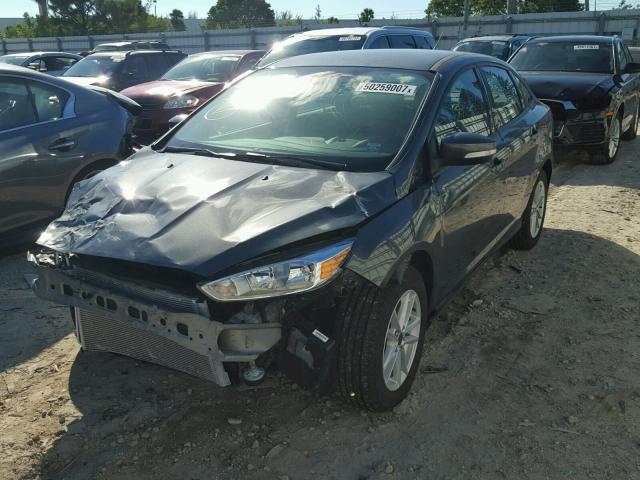 1FADP3F24HL283073 - 2017 FORD FOCUS SE GRAY photo 2