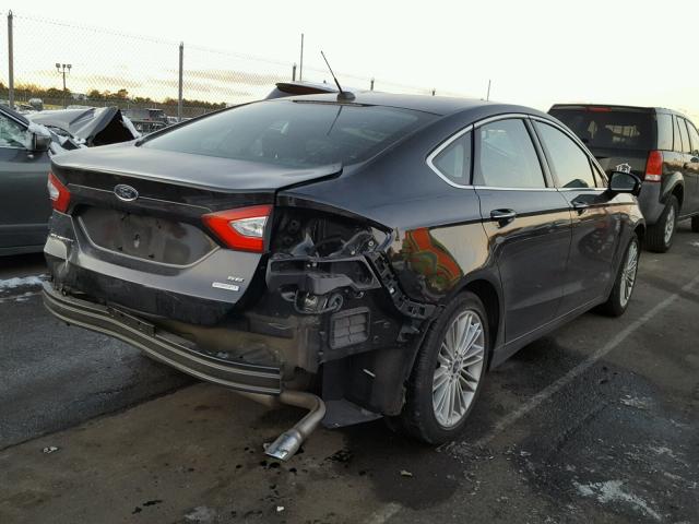 3FA6P0HD6FR272757 - 2015 FORD FUSION SE BLACK photo 4