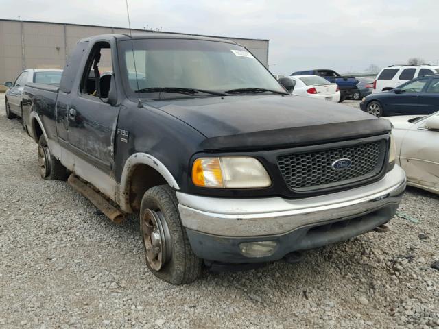 1FTRX18L9YNB55474 - 2000 FORD F150 BLACK photo 1