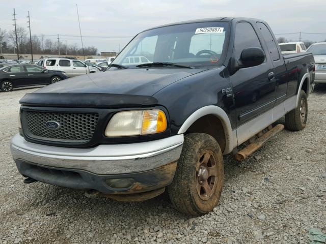 1FTRX18L9YNB55474 - 2000 FORD F150 BLACK photo 2