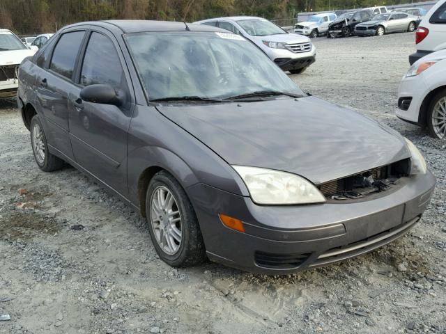 1FAFP34N77W247428 - 2007 FORD FOCUS ZX4 GRAY photo 1