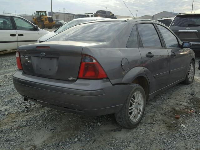 1FAFP34N77W247428 - 2007 FORD FOCUS ZX4 GRAY photo 4