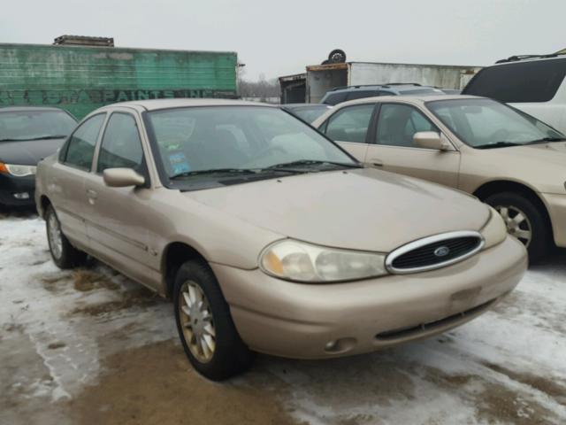 1FAFP663XXK142628 - 1999 FORD CONTOUR SE TAN photo 1