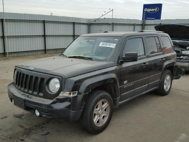 1J4NT4GB2BD203280 - 2011 JEEP PATRIOT LA BLACK photo 2