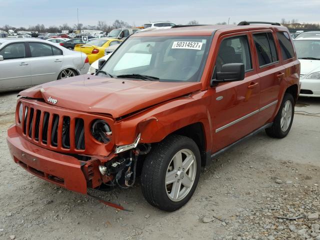 1J4NT1GA9AD625650 - 2010 JEEP PATRIOT SP ORANGE photo 2