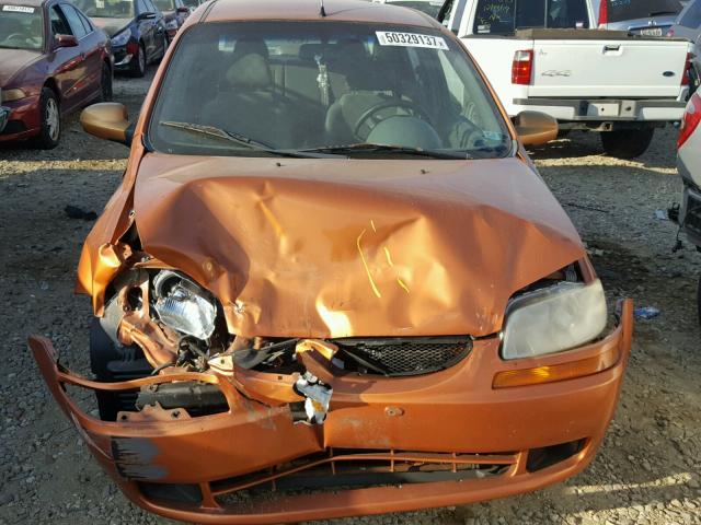 KL1TD52685B426487 - 2005 CHEVROLET AVEO BASE ORANGE photo 7