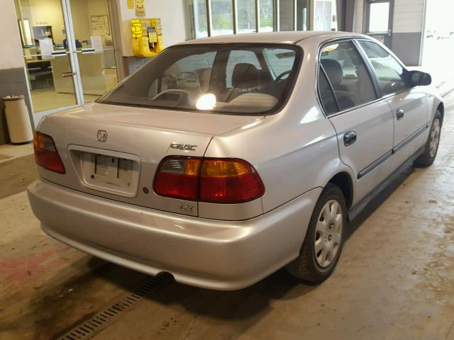 2HGEJ6672XH569904 - 1999 HONDA CIVIC LX SILVER photo 4