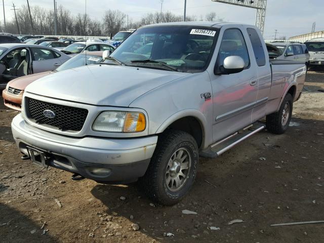 1FTRX18L12NA41721 - 2002 FORD F150 GRAY photo 2