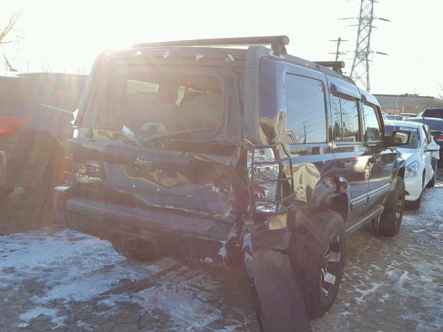 1J8HG48N06C274871 - 2006 JEEP COMMANDER BLACK photo 4