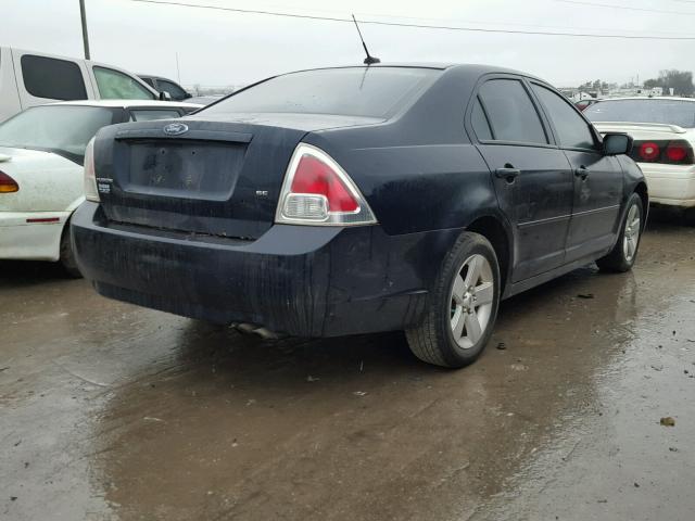 3FAHP07Z69R192269 - 2009 FORD FUSION SE BLUE photo 4