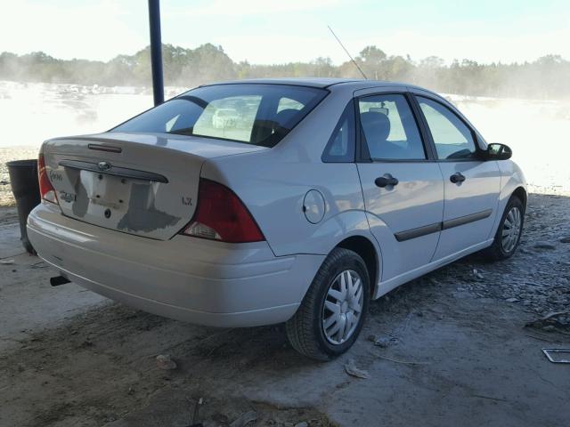 1FAFP33P5YW265267 - 2000 FORD FOCUS LX WHITE photo 4