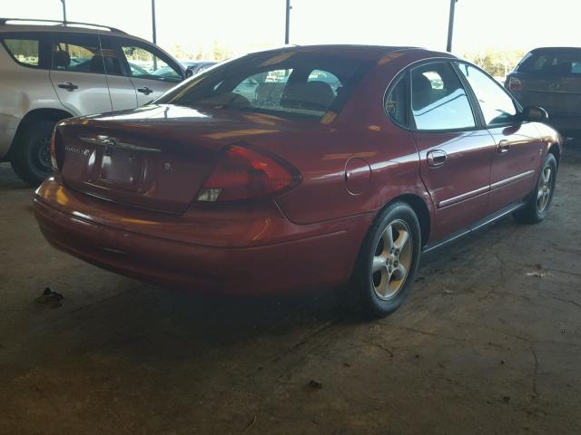 1FAFP55S7YA277656 - 2000 FORD TAURUS SES RED photo 4