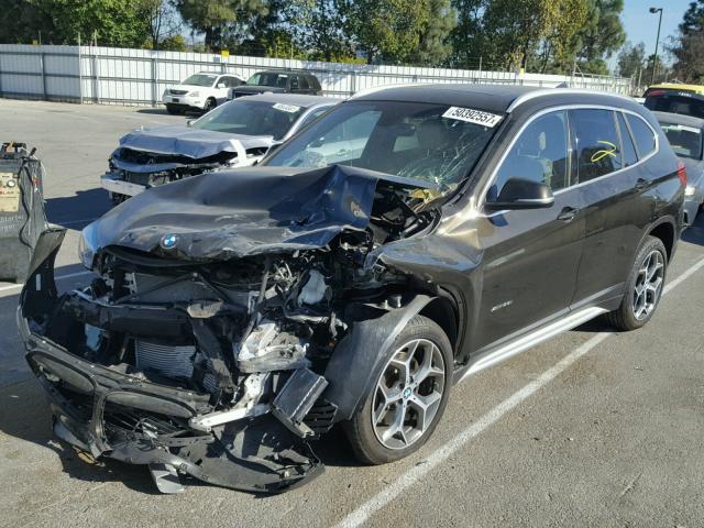 WBXHT3C34H5F68242 - 2017 BMW X1 XDRIVE2 بني صورة 2