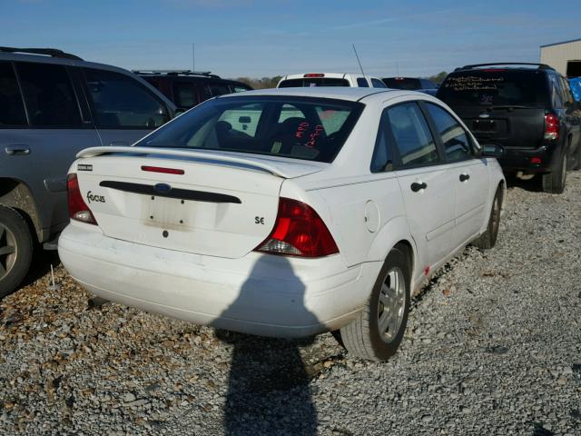 1FAFP34Z24W118270 - 2004 FORD FOCUS SE C WHITE photo 4