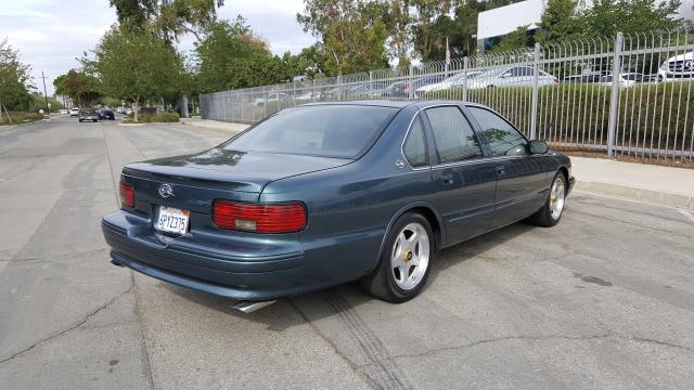 1G1BL52P4TR159636 - 1996 CHEVROLET IMPALA SS GREEN photo 4