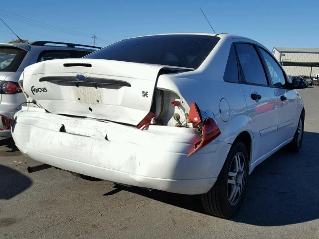 1FAFP34P11W323315 - 2001 FORD FOCUS SE WHITE photo 4