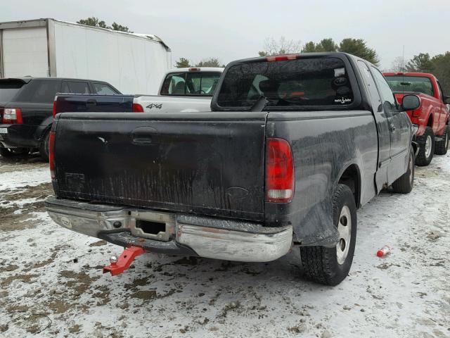 1FTZX17211NB63910 - 2001 FORD F150 BLACK photo 4