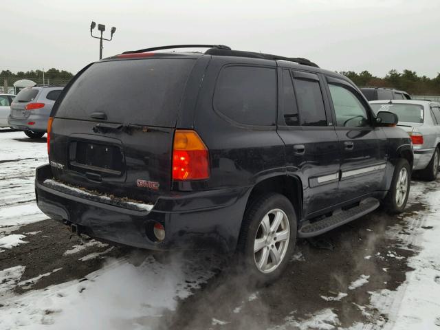 1GKDT13S922310803 - 2002 GMC ENVOY BLACK photo 4