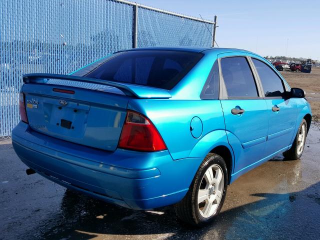 1FAHP34N77W211277 - 2007 FORD FOCUS ZX4 BLUE photo 4