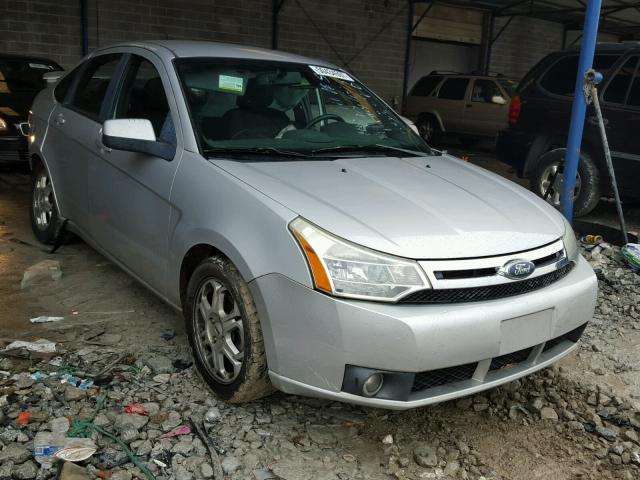 1FAHP36NX9W215694 - 2009 FORD FOCUS SES GRAY photo 1