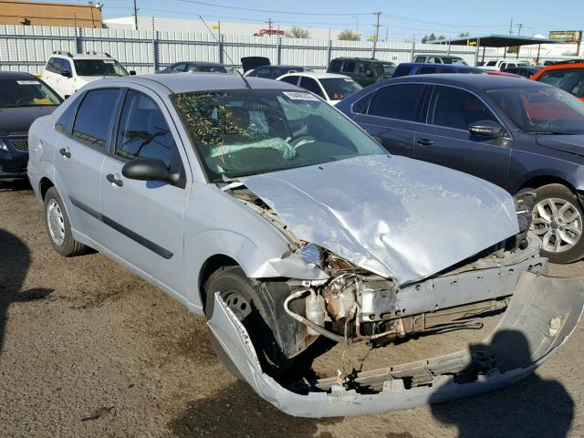 1FAFP33P74W158652 - 2004 FORD FOCUS LX SILVER photo 1