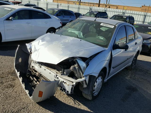 1FAFP33P74W158652 - 2004 FORD FOCUS LX SILVER photo 2