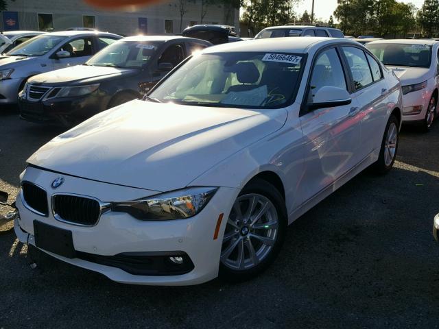 WBA8E1G38HNU18568 - 2017 BMW 320 I WHITE photo 2