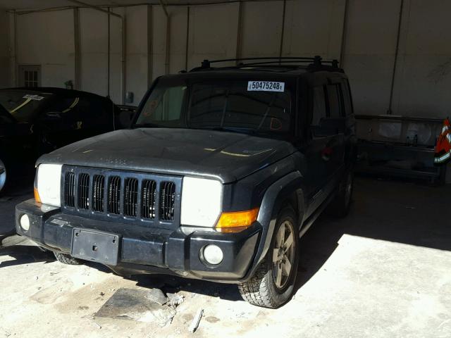 1J8HG48K06C252360 - 2006 JEEP COMMANDER BLACK photo 2