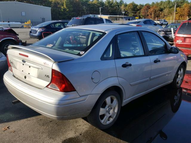 1FAFP38Z14W111322 - 2004 FORD FOCUS ZTS GRAY photo 4