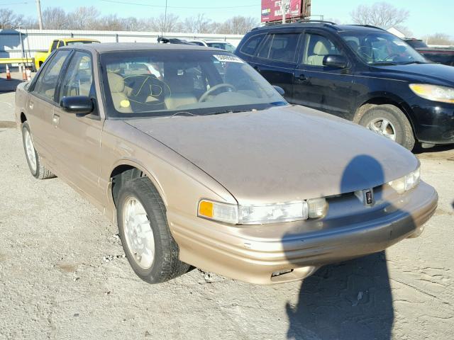 1G3WH52M4SD397658 - 1995 OLDSMOBILE CUTLASS SU TAN photo 1