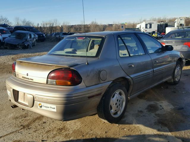 1G2NE52M7VM549672 - 1997 PONTIAC GRAND AM S TAN photo 4