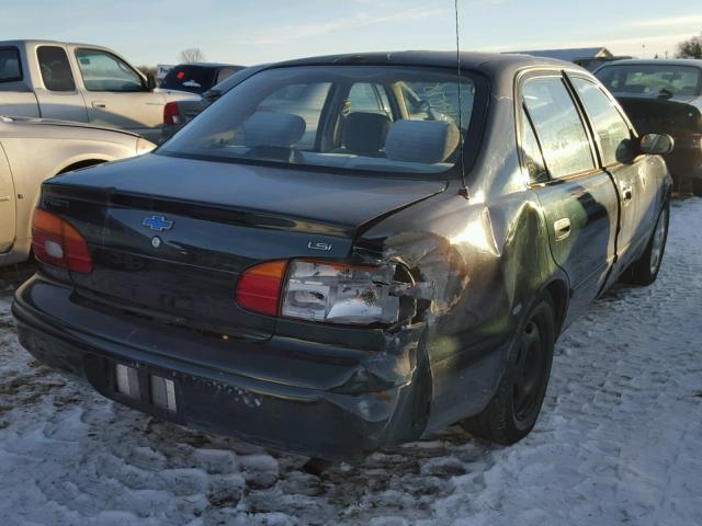 1Y1SK528XXZ434074 - 1999 CHEVROLET GEO PRIZM GREEN photo 4