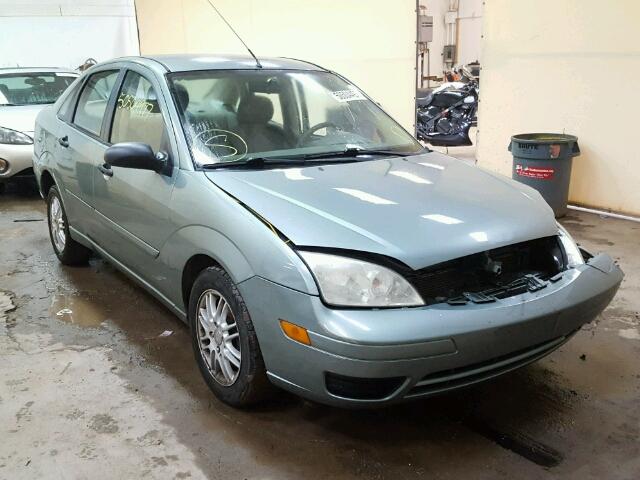 1FAFP34N65W239575 - 2005 FORD FOCUS ZX4 GRAY photo 1