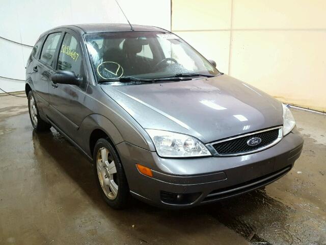 1FAHP37NX7W286423 - 2007 FORD FOCUS ZX5 GRAY photo 1