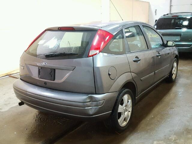 1FAHP37NX7W286423 - 2007 FORD FOCUS ZX5 GRAY photo 4