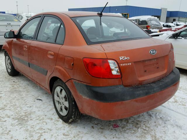 KNADE223X96516489 - 2009 KIA RIO BASE ORANGE photo 3