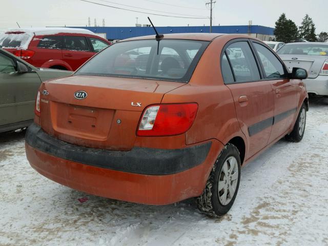 KNADE223X96516489 - 2009 KIA RIO BASE ORANGE photo 4