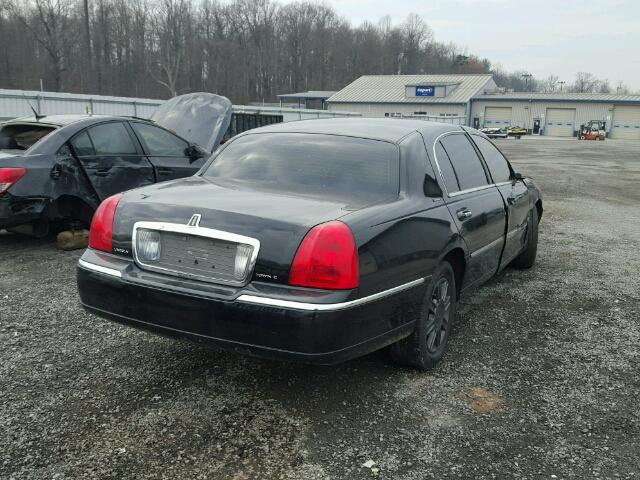 1LNHM84W77Y613311 - 2007 LINCOLN TOWN CAR E BLACK photo 4