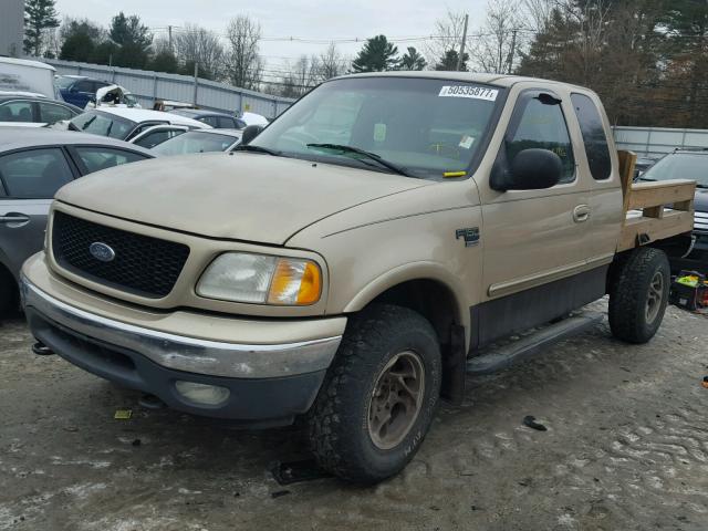 1FTRX18L3YNA60957 - 2000 FORD F150 GOLD photo 2