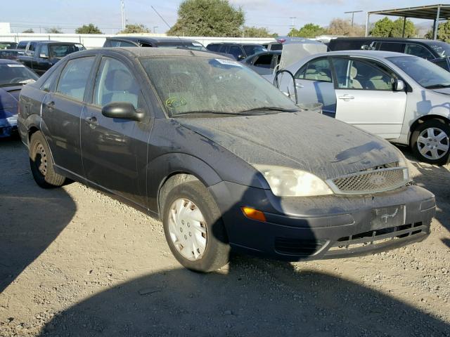 1FAFP34NX5W143271 - 2005 FORD FOCUS ZX4 GRAY photo 1