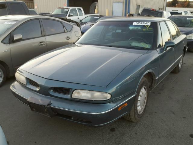 1G3HN52K4V4836751 - 1997 OLDSMOBILE 88 BASE TURQUOISE photo 2