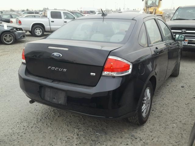 1FAHP3FN2AW242974 - 2010 FORD FOCUS SE BLACK photo 4