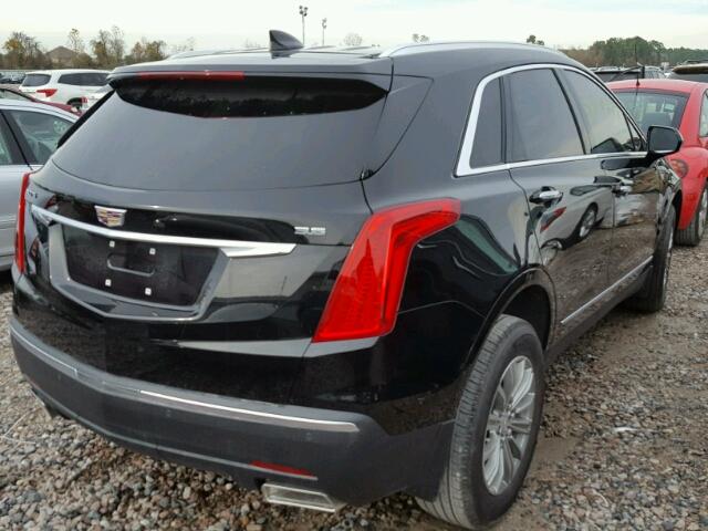 1GYKNCRS8JZ100371 - 2018 CADILLAC XT5 LUXURY BLACK photo 4