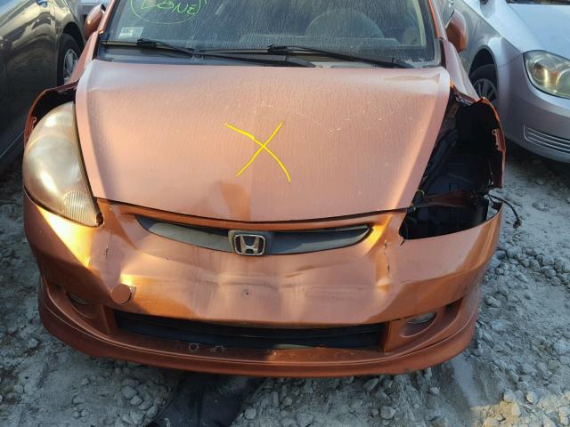 JHMGD37658S006373 - 2008 HONDA FIT SPORT ORANGE photo 7