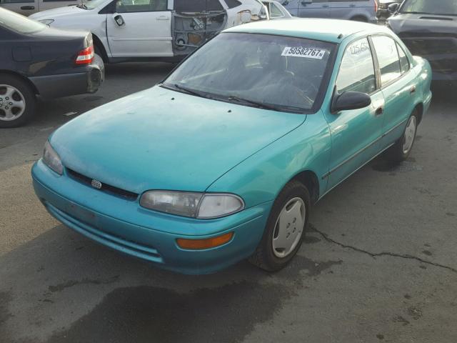 1Y1SK5362PZ009560 - 1993 GEO PRIZM BASE GREEN photo 2