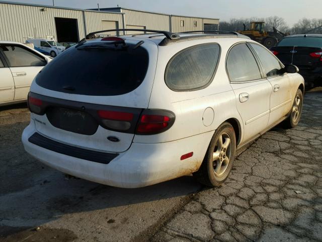 1FAFP58U0YA248092 - 2000 FORD TAURUS SE WHITE photo 4