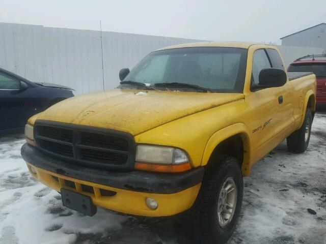 1B7GG22YXXS229342 - 1999 DODGE DAKOTA YELLOW photo 2