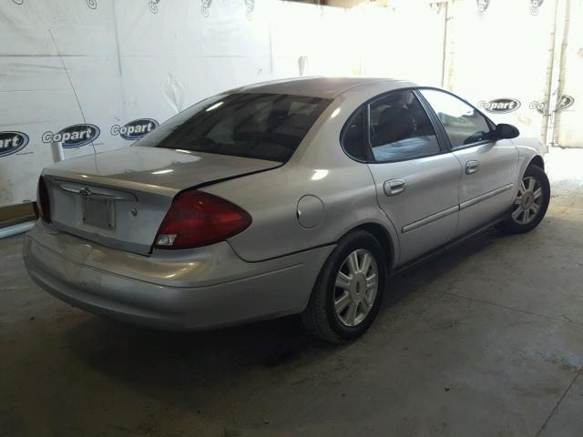 1FAFP52U1YA287878 - 2000 FORD TAURUS LX SILVER photo 4