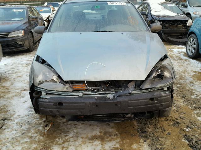 1FAFP34Z94W201761 - 2004 FORD FOCUS SE C GREEN photo 9